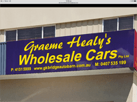 Graeme Healy's Wholesale Cars logo