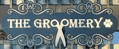 The Groomery logo