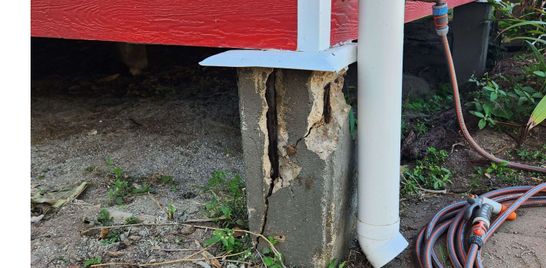 A damaged concrete post