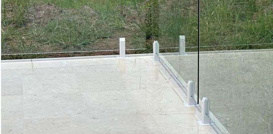 Frameless Glass Fencing with White Spigots